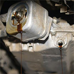 dark oil leaking from engine