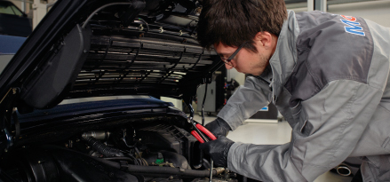 mechanic repairing car